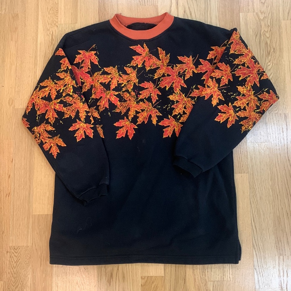 Black crewneck with orange leaves design